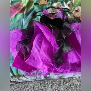 Disney brand deluxe Ursula Costume comes complete with crown. Size large. New.